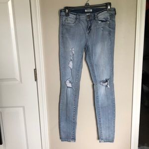 Light wash distressed skinny jeans